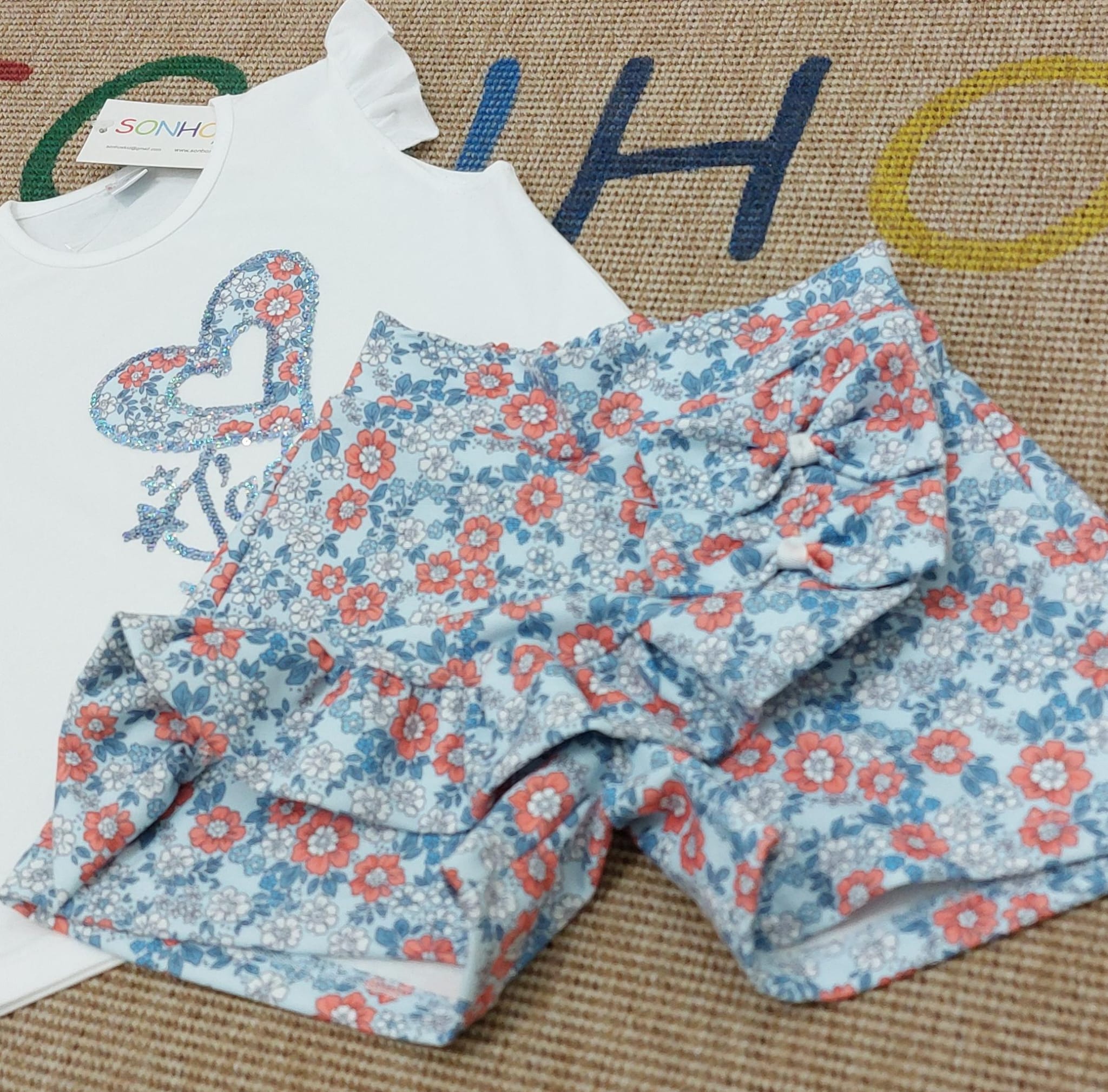Conjunto saia calção flores azuis
