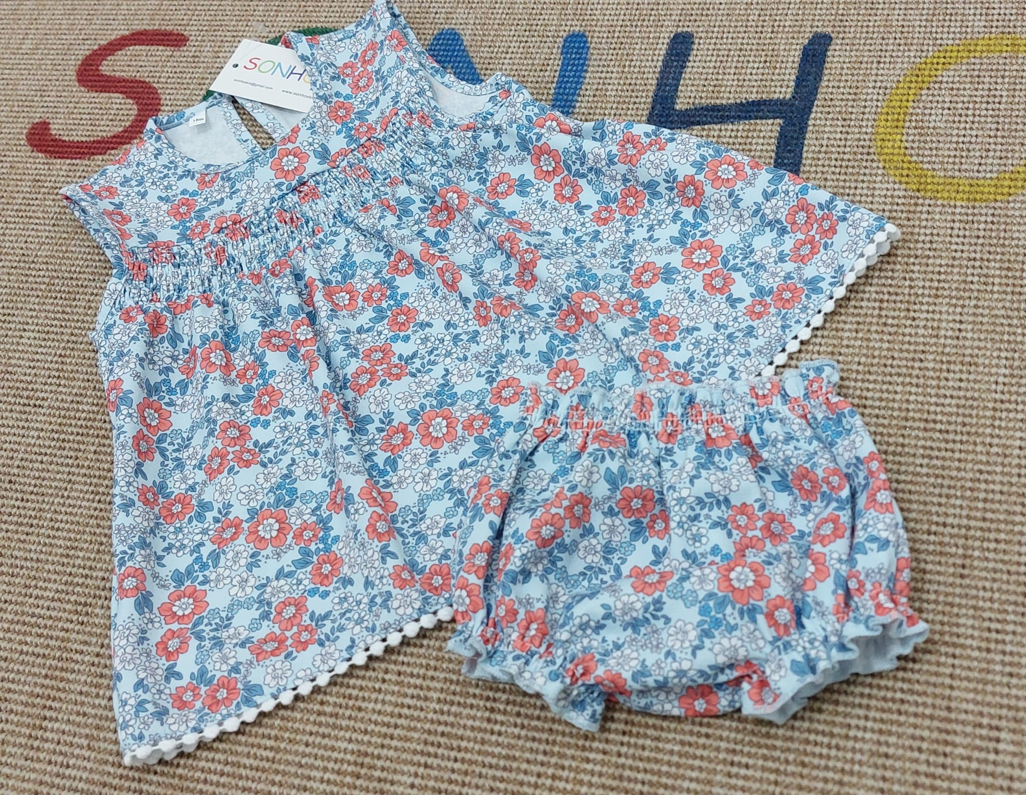 Conjunto bebé flores azuis