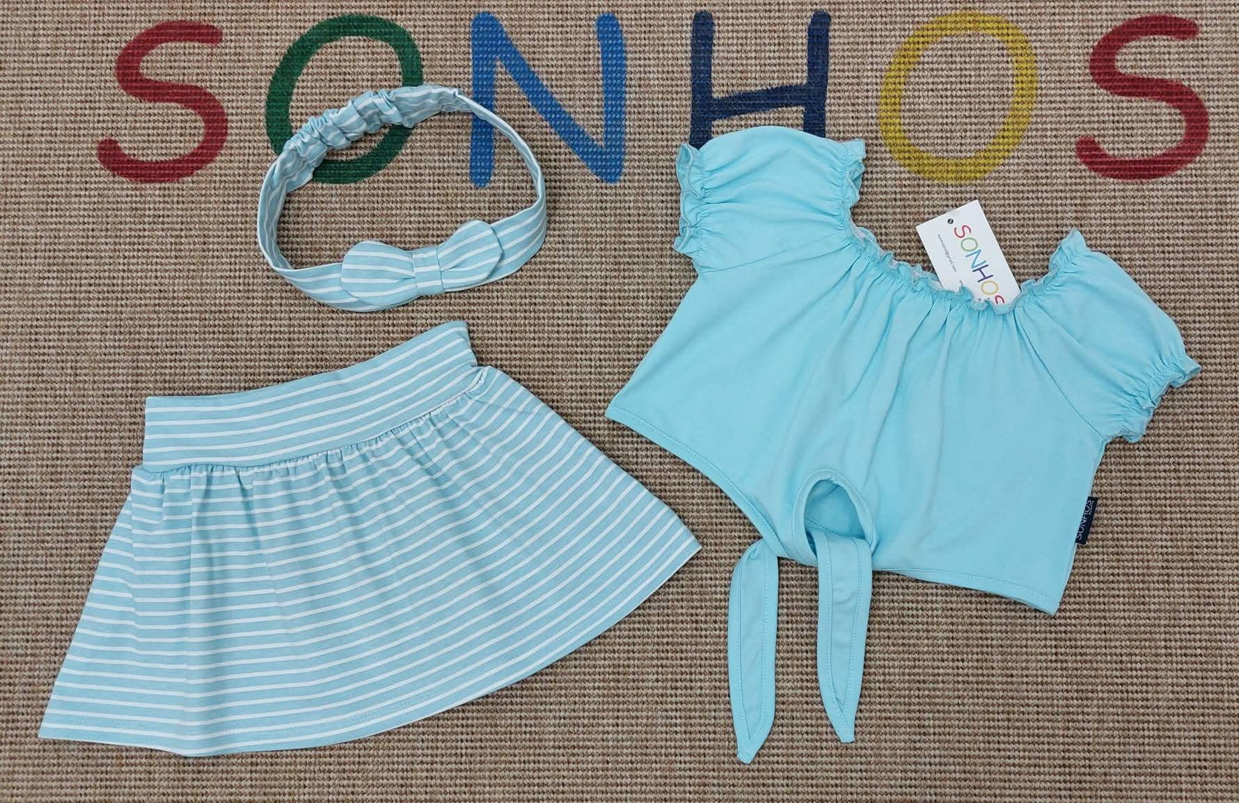 Conjunto saia riscas com fita